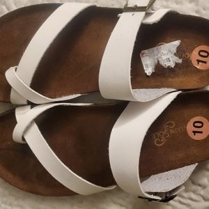 White birkenstock style sandals